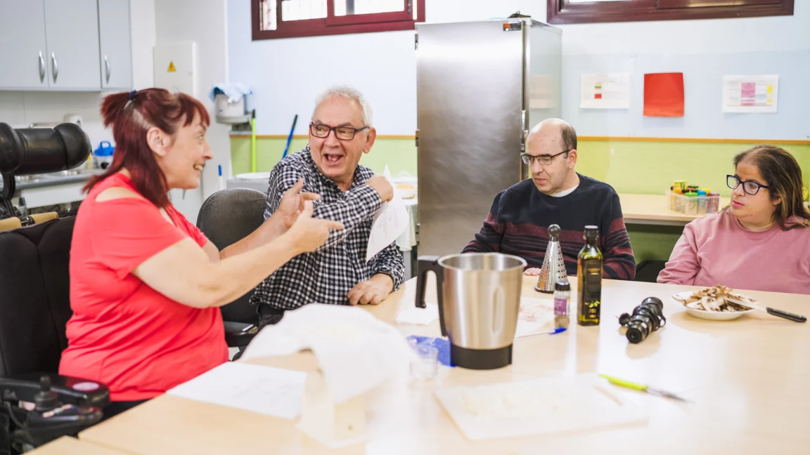 Group of disabled friends in cooking class